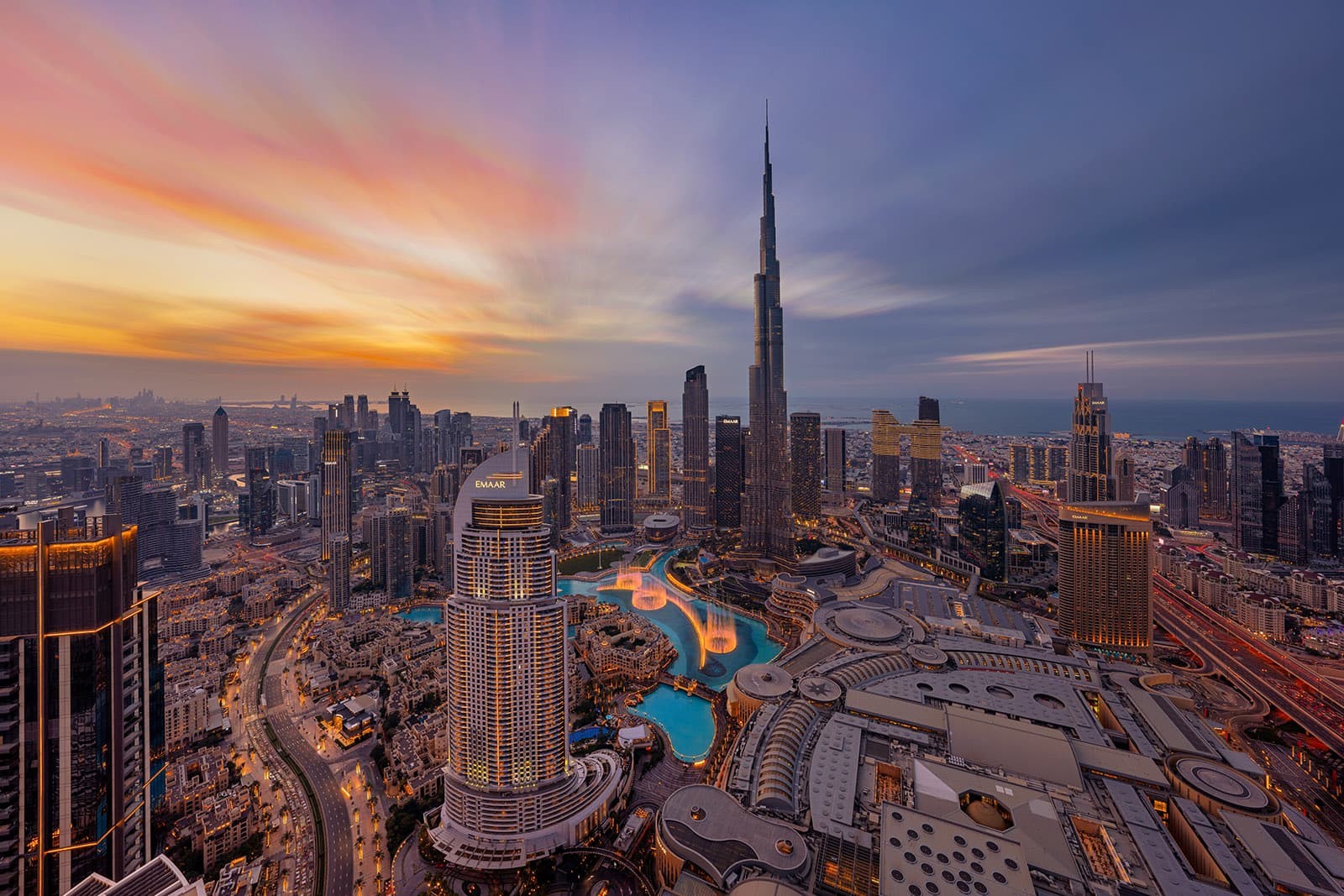 downtown-dubai-burj-khalifa-skyline-fountain-view-sunset-aerial-1753793869.jpg