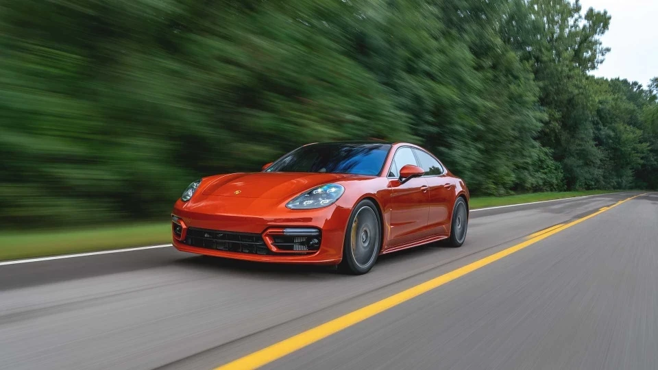 2021-porsche-panamera-turbo-s-front-three-quarter-action-1767668628.webp