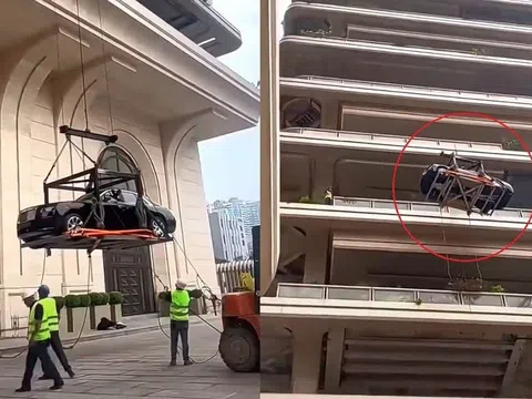 Tỷ phú Trung Quốc cho cẩu xe Rolls-Royce Ghost lên penhouse tầng 44